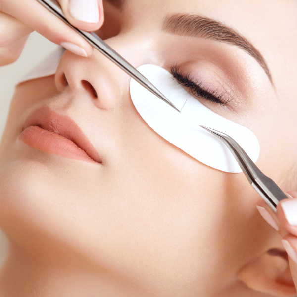 Eyelash extension service in progress